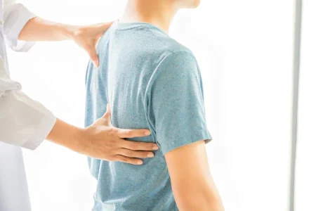 close-up-physiotherapist-working-with-patient-clinic_1150-15062